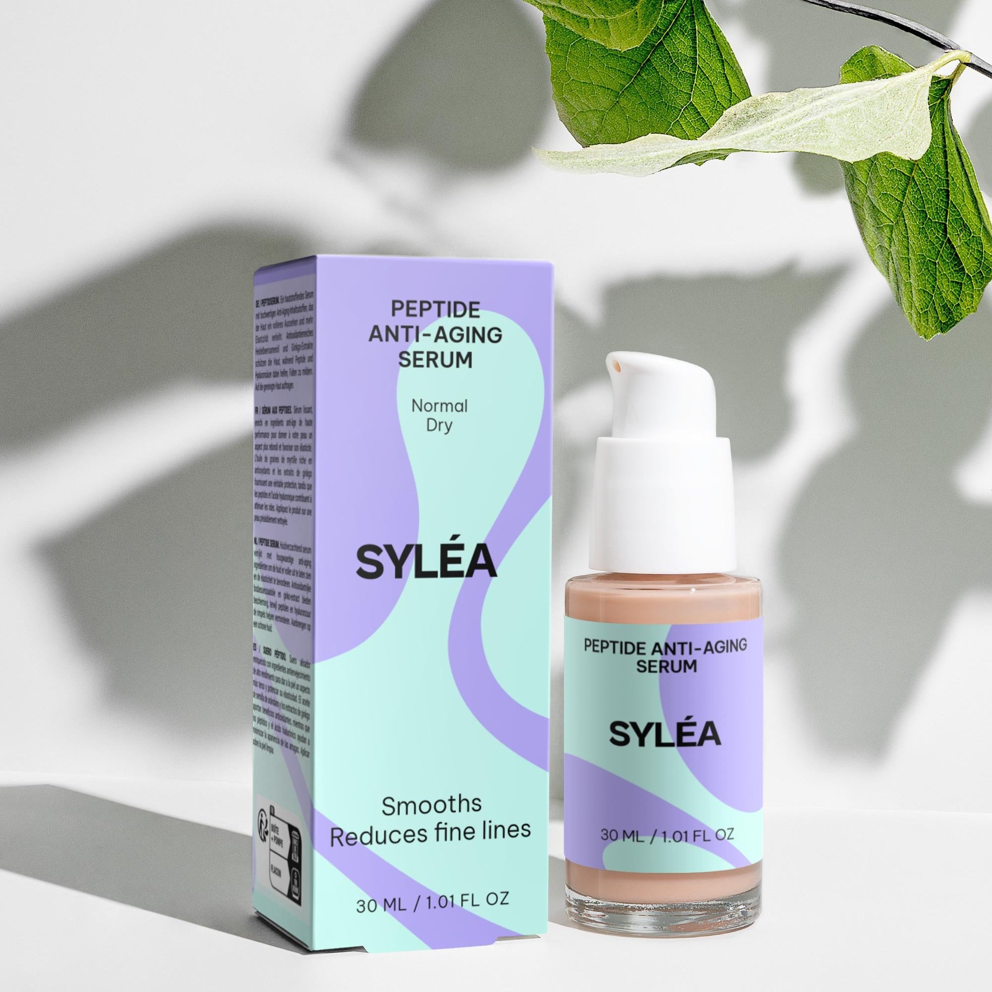 SYLÉA Peptide Anti-Aging Serum 30ml with packaging and natural leaves background